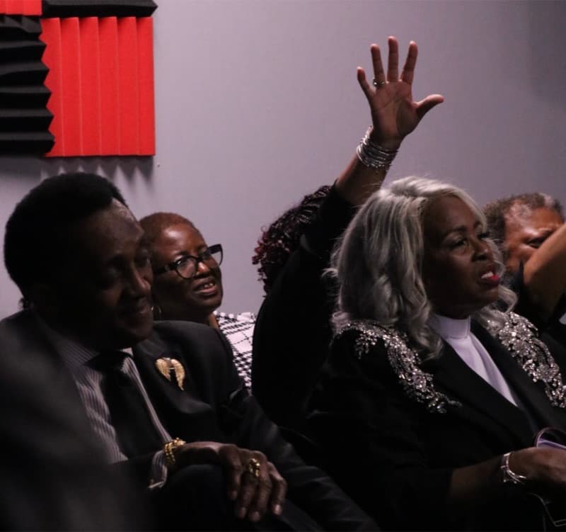 Members seated together during a service at Advance Church