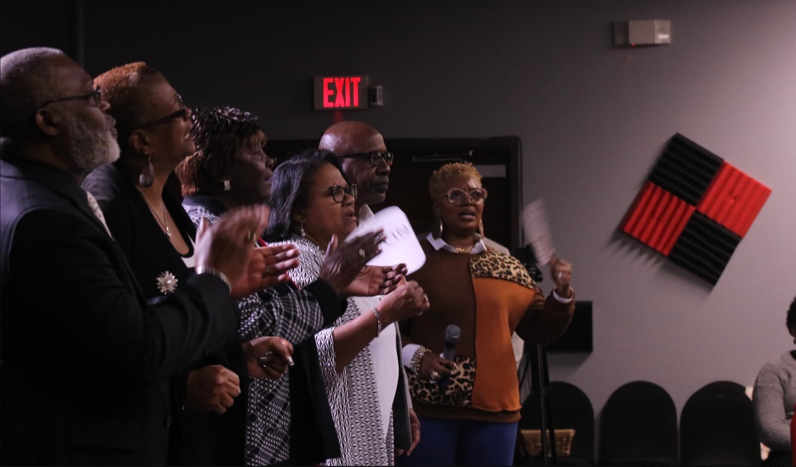 Members of Advance Church singing together during a service