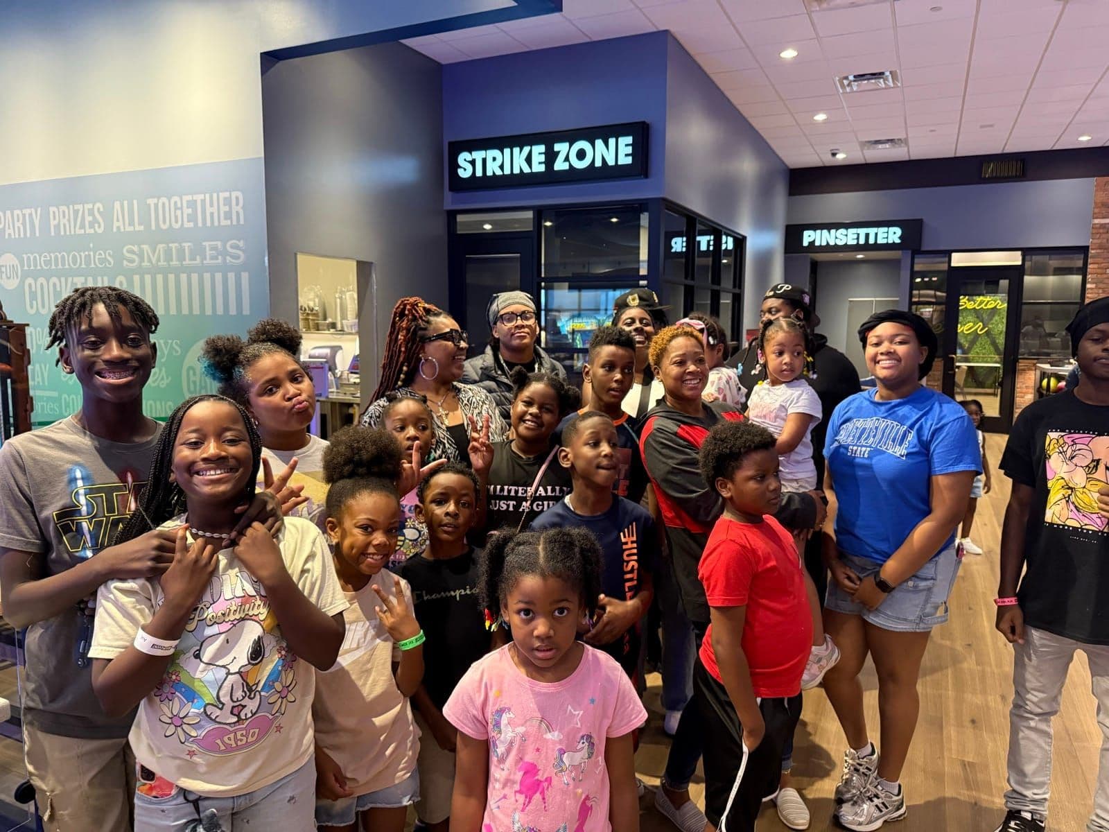 LitUp youth and leaders together on an outing at a bowling alley