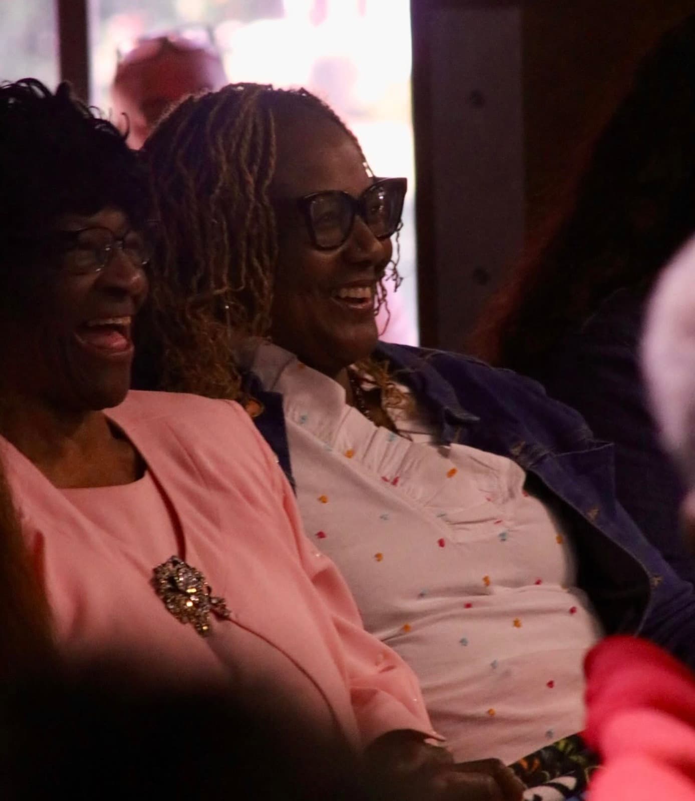 Members of Advance Church laughing together during a service